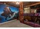 Harry Potter-themed bedroom with bunk beds and mural at 3937 Lana Ave, Davenport, FL 33897