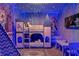 Frozen-themed bedroom with a castle-shaped bunk bed at 3937 Lana Ave, Davenport, FL 33897