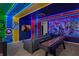 Superhero themed game room with shuffleboard and LED lighting at 3937 Lana Ave, Davenport, FL 33897