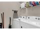 Laundry room with washer, dryer, and shelving at 3937 Lana Ave, Davenport, FL 33897