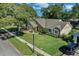 Home with a large yard and brick driveway at 5011 Winwood Way, Orlando, FL 32819