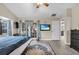 Main bedroom with king bed and sliding glass doors to patio at 5011 Winwood Way, Orlando, FL 32819
