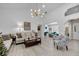 Open living space with hardwood floors, neutral color palette, and ample natural light at 5011 Winwood Way, Orlando, FL 32819