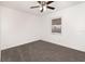 Spacious bedroom with gray carpet and ceiling fan at 5144 Orange Ave, Winter Park, FL 32792