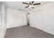 Well-lit bedroom with gray carpet and double doors at 5144 Orange Ave, Winter Park, FL 32792