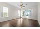 Bright bedroom with wood floors and large windows at 1108 Darnaby Way, Orlando, FL 32824