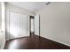 Cozy bedroom features a closet and view to other rooms through the hallways at 1108 Darnaby Way, Orlando, FL 32824