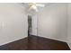 Bedroom with ceiling fan and access to upstairs hallway at 1108 Darnaby Way, Orlando, FL 32824