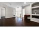 Open loft area with wood floors, built-in shelving, and natural light at 1108 Darnaby Way, Orlando, FL 32824