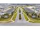 Aerial view of community entrance and roads at 1213 Red Hill Rd, Davenport, FL 33837