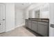 Modern bathroom with granite countertop and double vanity at 1213 Red Hill Rd, Davenport, FL 33837
