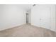 Simple bedroom with neutral wall and carpet at 1213 Red Hill Rd, Davenport, FL 33837