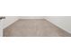 Empty bedroom with carpeted floor and white walls at 1213 Red Hill Rd, Davenport, FL 33837