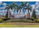 Photo of the Charles Cove community entrance sign with fountain at 1213 Red Hill Rd, Davenport, FL 33837