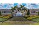 Community entrance with fountain and landscaping at 1213 Red Hill Rd, Davenport, FL 33837