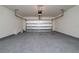 Two-car garage with an automatic door opener at 1213 Red Hill Rd, Davenport, FL 33837
