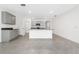 Open concept kitchen with gray cabinets and granite countertops at 1213 Red Hill Rd, Davenport, FL 33837