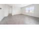 Bright living room with tile floors and neutral walls at 1213 Red Hill Rd, Davenport, FL 33837