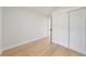 Well-lit bedroom with neutral walls and wood-look floors at 130 N Fairfax Ave, Winter Springs, FL 32708