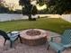 Relaxing patio with fire pit, perfect for outdoor gatherings at 1321 Maury Rd, Orlando, FL 32804