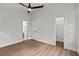Spacious bedroom with ample closet space and neutral decor at 1395 Kenneth Ave, Casselberry, FL 32707