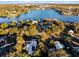 Aerial view of property near lake, showcasing its location at 1642 Athens St, Lakeland, FL 33803