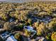 Wider aerial view showing home and neighborhood context at 1642 Athens St, Lakeland, FL 33803