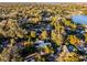 Aerial view of a house and surrounding neighborhood, near a lake at 1642 Athens St, Lakeland, FL 33803