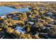 Aerial view showcasing home's location in a tree-lined neighborhood at 1642 Athens St, Lakeland, FL 33803