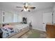 Bedroom with a daybed and built-in shelving at 1642 Athens St, Lakeland, FL 33803