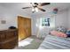 Bright bedroom with wood floors and a ceiling fan at 1642 Athens St, Lakeland, FL 33803