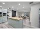 Kitchen with butcher block island and soft green shaker cabinets at 1642 Athens St, Lakeland, FL 33803