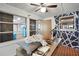 Bright sunroom with a desk and view into the home at 1642 Athens St, Lakeland, FL 33803