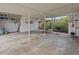 Covered carport with storage shelving at 2007 Natalen Rd, Winter Park, FL 32792