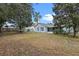 View of home from the backyard, showing screened patio at 2597 Auld Scot Blvd, Ocoee, FL 34761