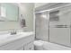Bathroom with tub shower, sink vanity and toilet at 3116 Oranole Rd, Orlando, FL 32810