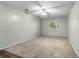 Spacious bedroom with ceiling fan and neutral carpeting at 3116 Oranole Rd, Orlando, FL 32810