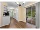 Kitchen with dining area and access to a screened porch at 3116 Oranole Rd, Orlando, FL 32810