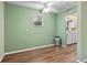 Dining area with wood flooring and view of kitchen at 3116 Oranole Rd, Orlando, FL 32810