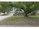 Ranch-style home with mature landscaping and a spacious yard at 3116 Oranole Rd, Orlando, FL 32810