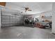 Attached garage with storage shelving at 3116 Oranole Rd, Orlando, FL 32810