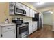 Kitchen with stainless steel appliances and laminate countertops at 3116 Oranole Rd, Orlando, FL 32810
