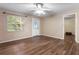 Spacious living room with hardwood floors and a view to the kitchen at 3116 Oranole Rd, Orlando, FL 32810