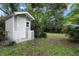 White storage shed in the backyard at 3116 Oranole Rd, Orlando, FL 32810