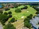 Aerial view of golf course near residential area at 3315 Parkchester Square Blvd # 102, Orlando, FL 32835