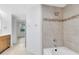 Bathroom with tub, shower, and updated vanity at 3315 Parkchester Square Blvd # 102, Orlando, FL 32835