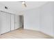 Light-filled bedroom with double closets and wood-look floors at 3315 Parkchester Square Blvd # 102, Orlando, FL 32835