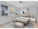 Main bedroom with wood floors and large windows at 3315 Parkchester Square Blvd # 102, Orlando, FL 32835