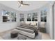 Bright bedroom with bay window and ceiling fan at 3315 Parkchester Square Blvd # 102, Orlando, FL 32835