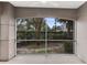 Screened-in porch overlooking a private backyard at 3315 Parkchester Square Blvd # 102, Orlando, FL 32835